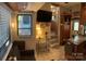 Relaxing RV living area with a comfortable sofa and recliner at 204 Lake Tillery Trl, Mount Gilead, NC 27306