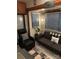 RV living area with sofa and recliner at 204 Lake Tillery Trl, Mount Gilead, NC 27306