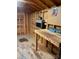 Interior of a storage shed with shelving and workbench at 204 Lake Tillery Trl, Mount Gilead, NC 27306
