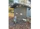 Exterior view of a storage shed with double doors at 204 Lake Tillery Trl, Mount Gilead, NC 27306