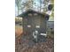 Exterior view of a storage shed with double doors at 204 Lake Tillery Trl, Mount Gilead, NC 27306