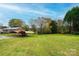 Large front yard with carport and ample green space at 2752 21St Ne St, Hickory, NC 28601