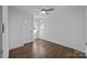 Bright bedroom with hardwood floors and ceiling fan at 415 E Horah St, Salisbury, NC 28144