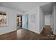 Light-filled entryway with hardwood floors and view to exterior at 415 E Horah St, Salisbury, NC 28144