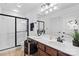 Clean bathroom with double vanity, shower, and modern fixtures at 4875 Polo Gate Blvd, Charlotte, NC 28216