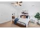 Bright bedroom with a king-size bed, ensuite bathroom access, and stylish decor at 4875 Polo Gate Blvd, Charlotte, NC 28216