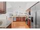 Updated kitchen featuring stainless steel appliances and granite countertops at 4875 Polo Gate Blvd, Charlotte, NC 28216