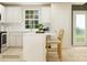 White kitchen with island and stainless steel appliances at 1074 Old Trade St, Edgemoor, SC 29712