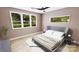 Bright bedroom with a comfortable bed and plenty of natural light at 150A Lookout Dam Rd, Statesville, NC 28625
