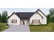 White brick home with dark gray roof, brown garage door, and landscaping at 150A Lookout Dam Rd, Statesville, NC 28625