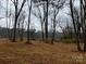 Wooded lot with mature trees and river views at 150A Lookout Dam Rd, Statesville, NC 28625