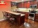 Finished basement bar with seating and stainless steel appliances at 191 Baymount Dr, Statesville, NC 28625