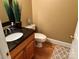 Small bathroom with granite countertop and wood cabinet at 191 Baymount Dr, Statesville, NC 28625