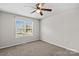 Spacious bedroom with neutral walls, carpet, and window at 203 Carwen Ct, Kannapolis, NC 28081