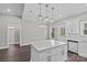 Modern kitchen with white cabinets and quartz countertops at 2620 Craig Ave, Concord, NC 28027