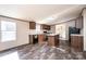 Modern kitchen with dark cabinets, granite countertops, and island at 3365 34Th Avenue Ne Ct, Hickory, NC 28601