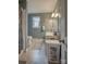 Clean bathroom with double vanity and shower/tub combo at 3842 22Nd Street Ne Ct, Hickory, NC 28601