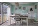Bright dining area with a table and chairs near sliding glass door at 3842 22Nd Street Ne Ct, Hickory, NC 28601