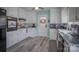 Galley kitchen with white cabinets and granite countertops at 3842 22Nd Street Ne Ct, Hickory, NC 28601