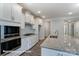 Modern kitchen with white cabinets, granite countertops, and stainless steel appliances at 4009 Grace Pointe Dr # 101, Indian Trail, NC 28079