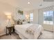 Secondary bedroom with a queen-size bed and natural light at 4064 Skyboat Cir, Fort Mill, SC 29715