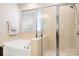 Bathroom with soaking tub and shower at 6712 Colonial Garden Dr, Huntersville, NC 28078