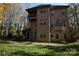 Brick house with a large backyard and multi-level design at 809 Pine Forest Rd, Charlotte, NC 28214