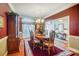 Elegant dining room with hardwood floors and a chandelier at 8420 Locksley Dr, Harrisburg, NC 28075