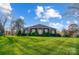 House exterior showcasing brick facade and manicured lawn at 8420 Locksley Dr, Harrisburg, NC 28075