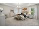 Luxurious main bedroom with plush bedding and elegant furnishings at 1464 Hubert Graham Way, Tega Cay, SC 29708