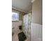 Bathroom with shower stall and leaf-patterned curtain at 162 Jennings Rd, Statesville, NC 28625