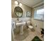 Clean bathroom with pedestal sink and tiled walls at 162 Jennings Rd, Statesville, NC 28625