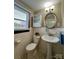 Clean bathroom with pedestal sink and shower/tub at 162 Jennings Rd, Statesville, NC 28625