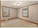 Simple bedroom with neutral walls and carpet at 162 Jennings Rd, Statesville, NC 28625