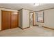 Bedroom with wood floors and access to bathroom at 162 Jennings Rd, Statesville, NC 28625