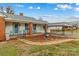 Brick ranch home with a covered carport and rocking chairs on the porch at 162 Jennings Rd, Statesville, NC 28625