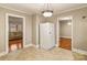 Bright kitchen features a refrigerator and views into adjoining living areas at 162 Jennings Rd, Statesville, NC 28625