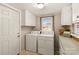 Laundry room with washer, dryer, and storage at 162 Jennings Rd, Statesville, NC 28625