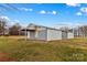 Detached workshop with large doors and covered porch at 162 Jennings Rd, Statesville, NC 28625