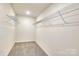 Spacious walk-in closet with wire shelving; ample storage at 2029 Bayou Trace Dr, Charlotte, NC 28262