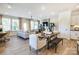 Open dining area with a wooden table and bench seating at 2109 Bayou Trace Dr, Charlotte, NC 28262