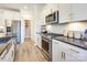 Modern kitchen features stainless steel appliances and a spacious island at 2109 Bayou Trace Dr # Lot 11, Charlotte, NC 28262