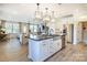 Modern kitchen with large island and stainless steel appliances at 2109 Bayou Trace Dr # Lot 11, Charlotte, NC 28262