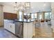 Modern kitchen island with stainless steel appliances and ample counter space at 2109 Bayou Trace Dr # Lot 11, Charlotte, NC 28262