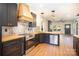 Contemporary kitchen with stainless steel appliances and a butcher block island at 255 Bellhaven Nw Pl, Concord, NC 28027