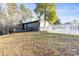 Contemporary home with black and white exterior and a deck at 335 Eastcliff Se Dr, Concord, NC 28025