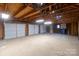 Spacious interior of a three-car garage at 425 N 5Th St, Albemarle, NC 28001