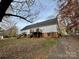 Another view of the house from the back, showing driveway and yard at 4761 Sand Clay Rd, Hickory, NC 28602