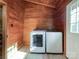 Bright laundry room with stackable washer and dryer at 5407 Davis Rd, Waxhaw, NC 28173