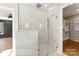 Large walk-in shower with marble tile and glass enclosure at 555 Riddle Mill Rd, Clover, SC 29710